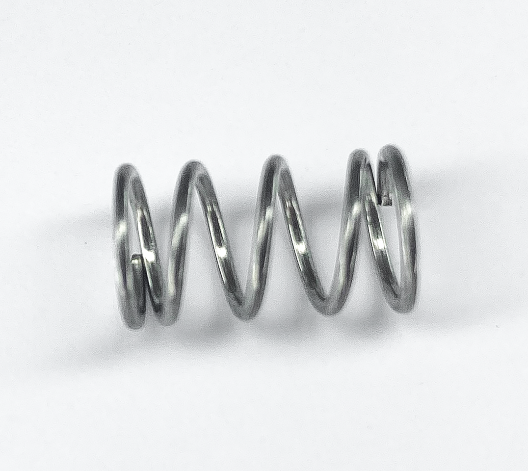 Spring, idle adjuster